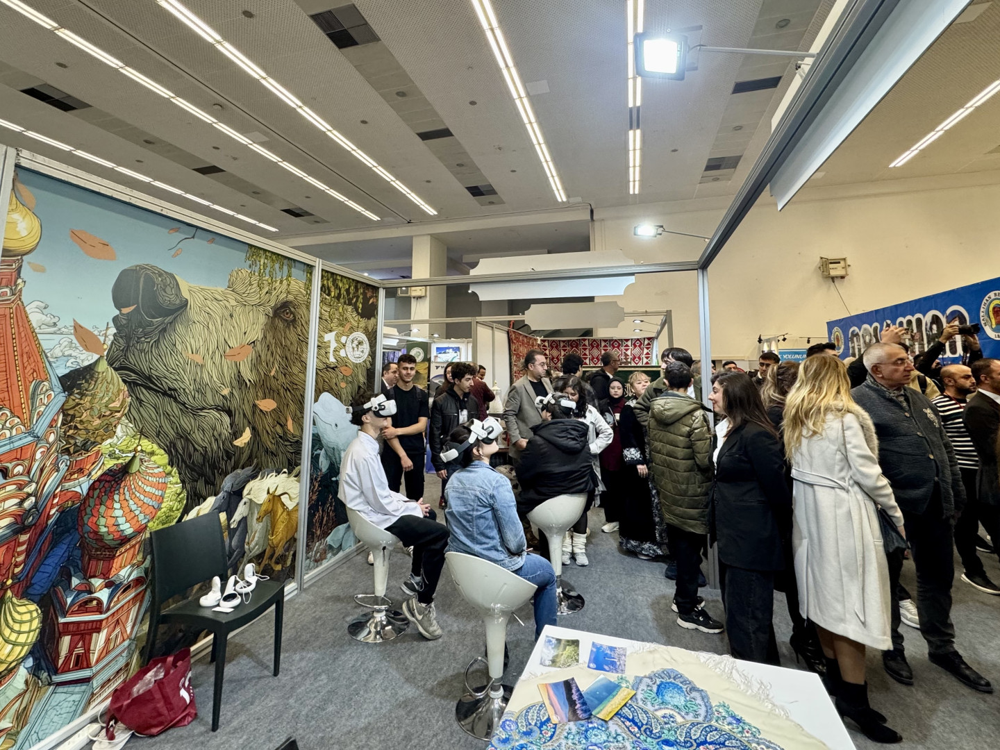 The guests of the exhibition at the stand of the RGS. Photo: RGS press service