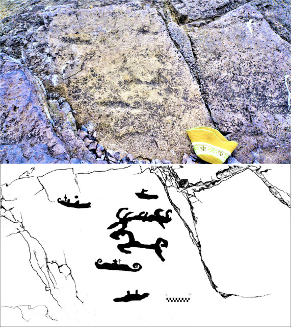 Петроглифы и их прорисовка. Фото: Игорь Бондарь