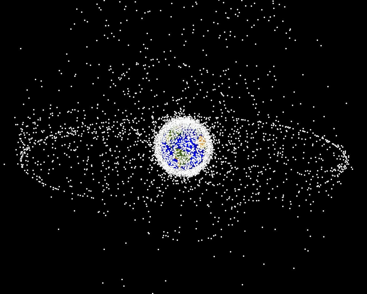 Компьютерная модель распределения космических объектов в околоземном пространстве, согласно описанию NASA 95 % из них являются мусором. Фото: wikipedia.org/NASA