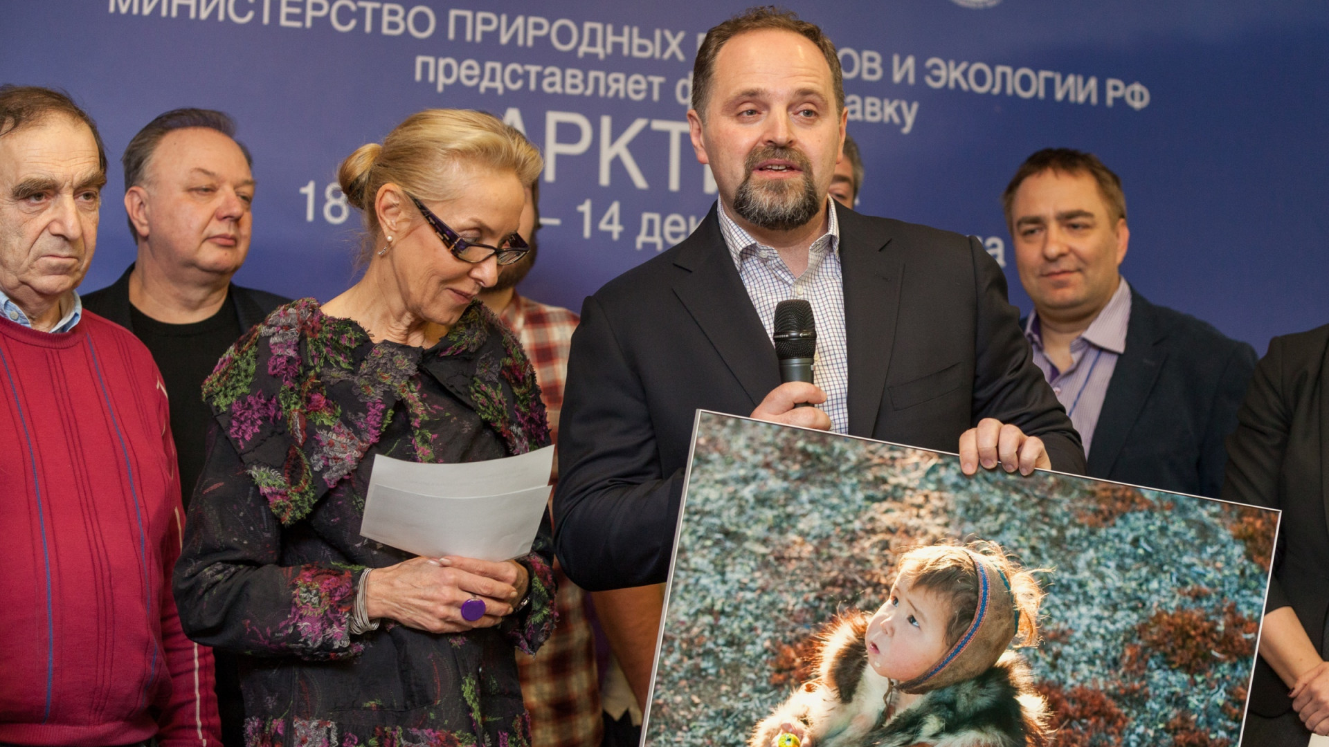 Sergei Donskoi giving a gift from Russian Prime Minister Dmitry Medvedev