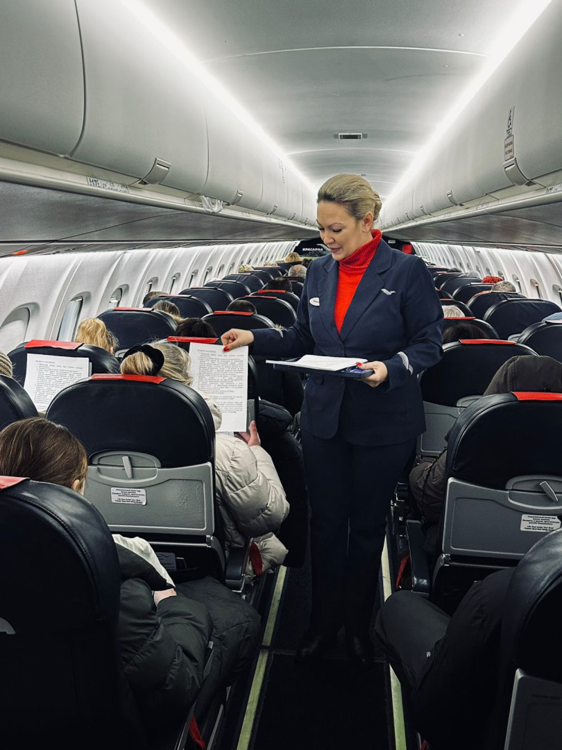 The Geographical Dictation on board an aircraft. Photo: “KrasAvia” airline