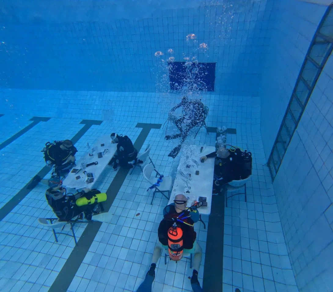 In Norilsk, the Geographical Dictation of the RGS was taken underwater. Photo: Anna Moroz / Krasnoyarsk Regional Branch of the RGS